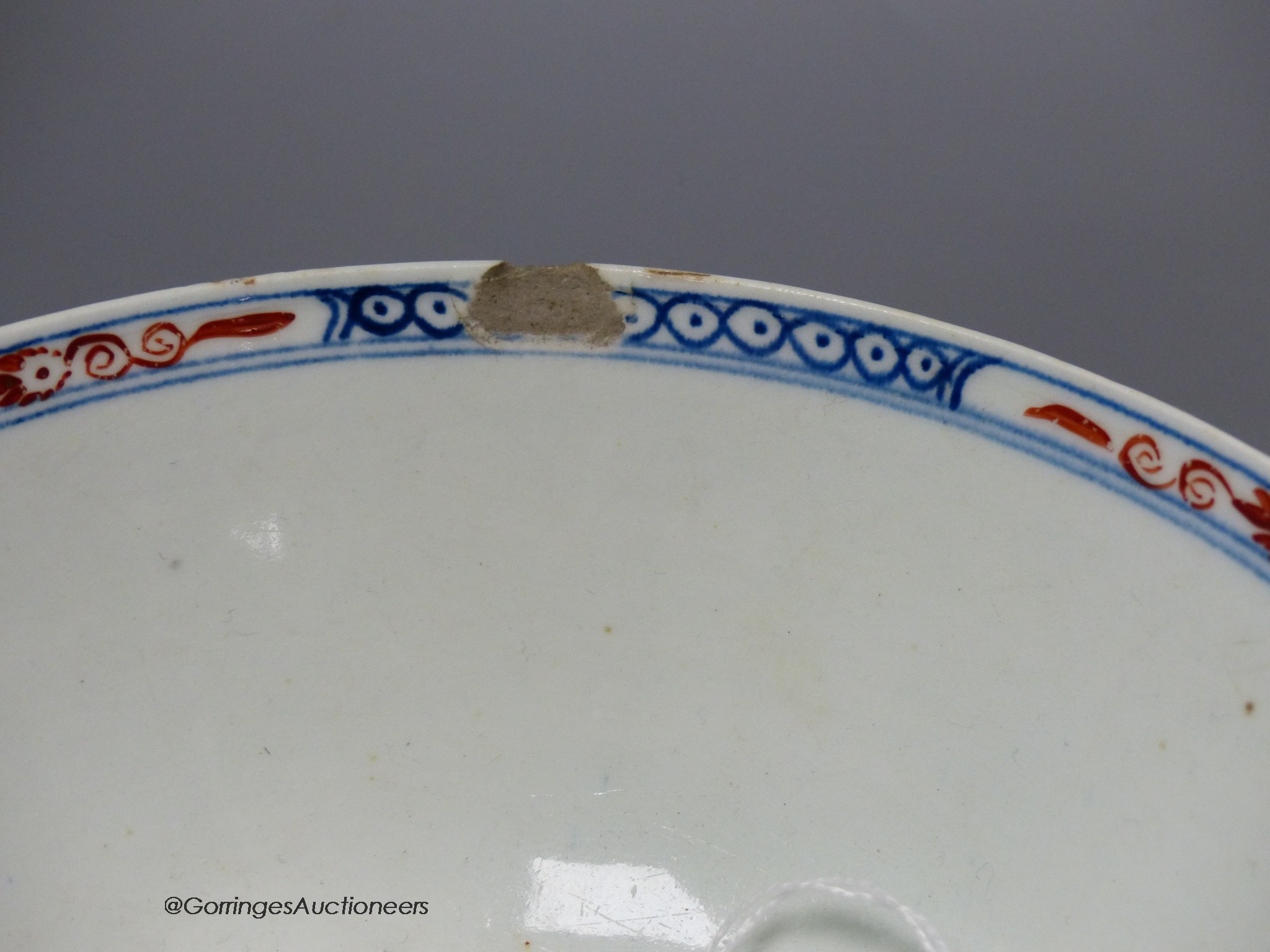 Lowestoft bowl painted in Redgrave style with Two Birds pattern and another painted with a chrysanthemum, fence and a holed rock, 16cm diameter